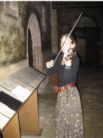 Kira playing travel violin